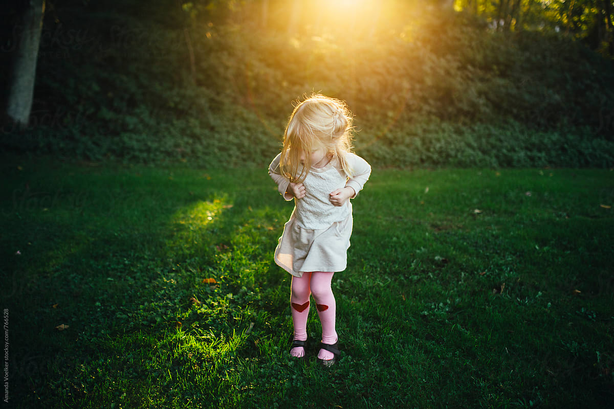 Little Girl Does the Chicken Dance in the Light of the Setting Sun