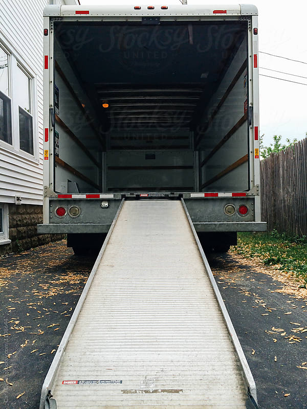 Empty moving van in the driveway