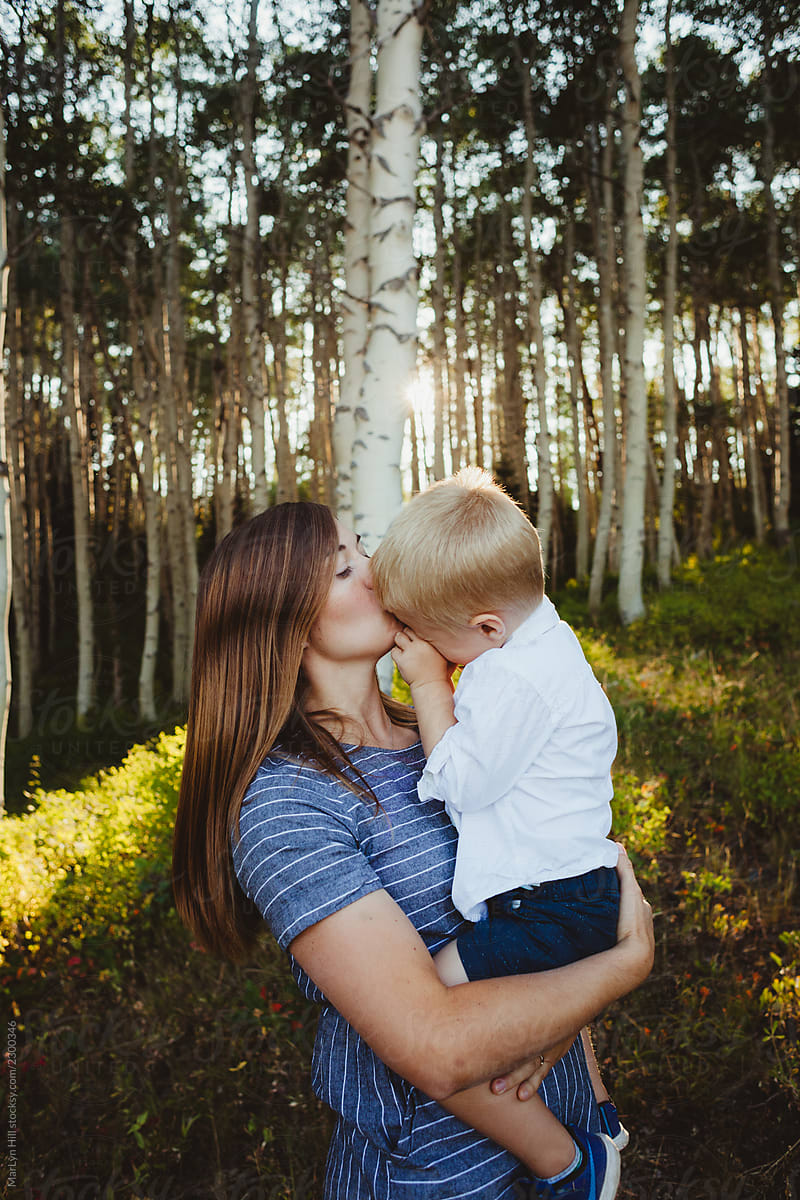 Forest forehead kiss from mom.