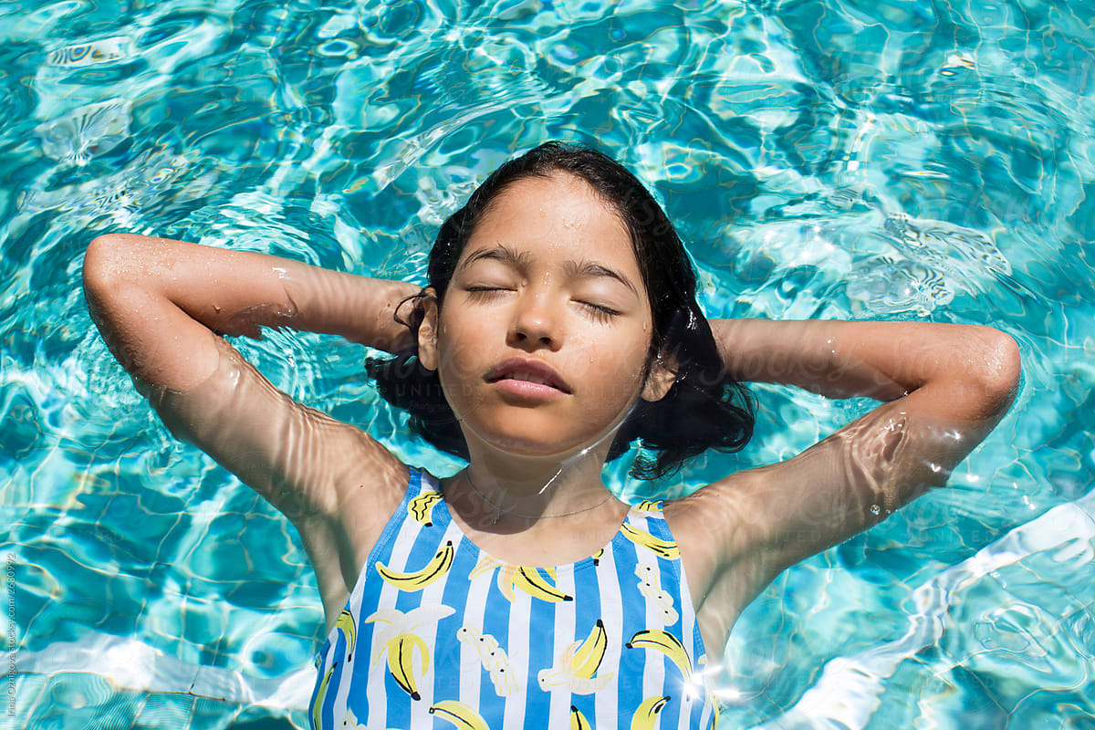 Young girl in swimming pool, Stock Photo, Picture And Rights