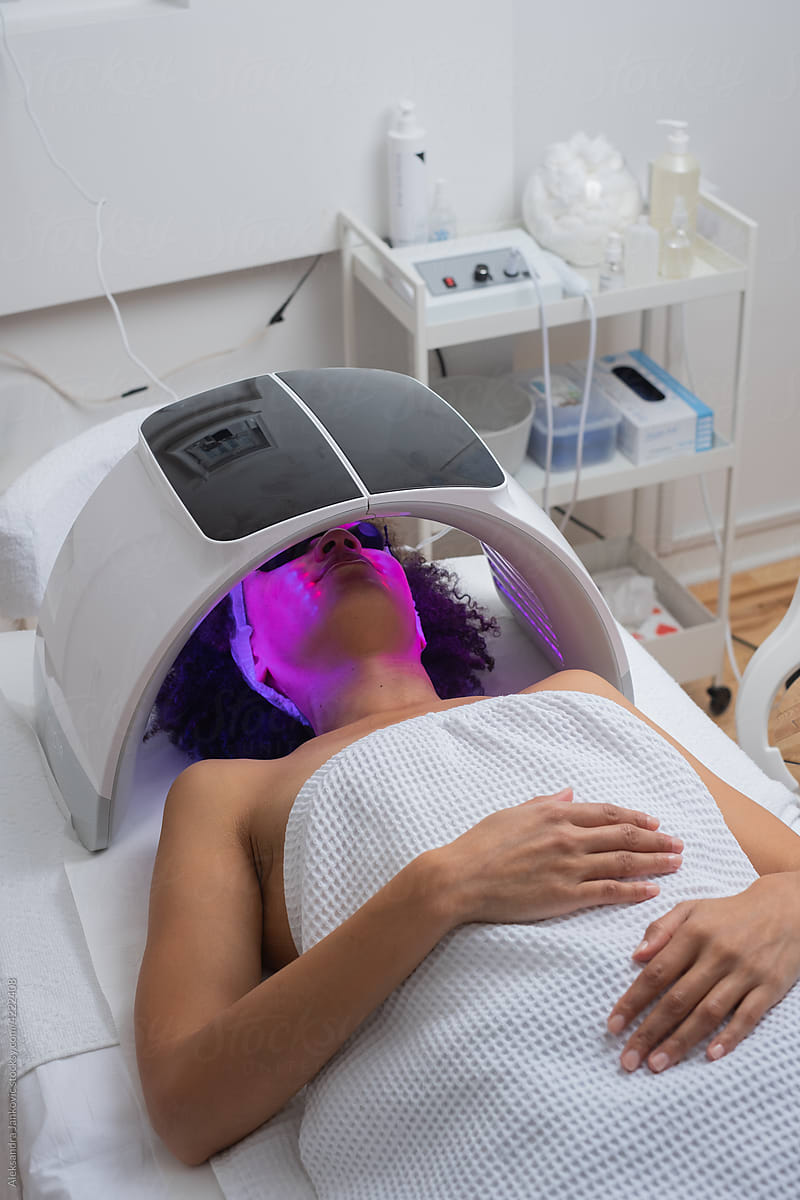 Anonymous Woman Having A LED Light Facial Therapy