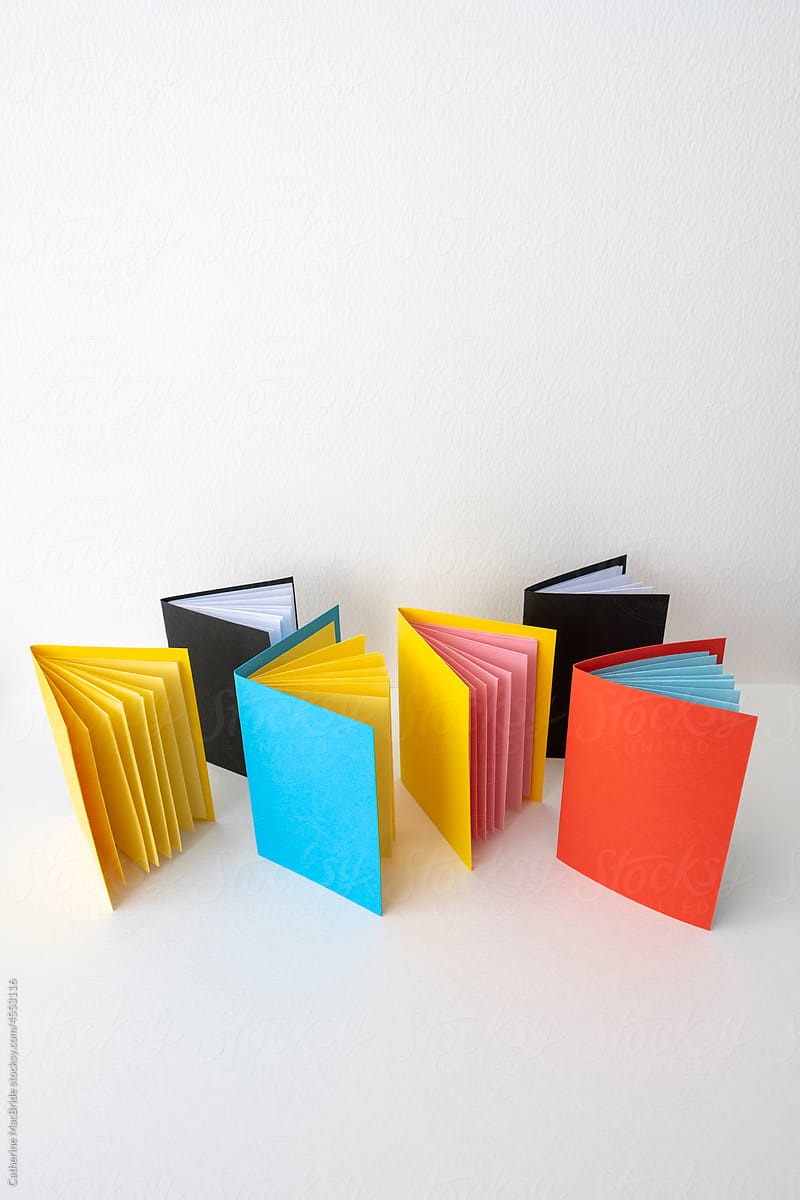 Little hand made paper notebooks in bright colors