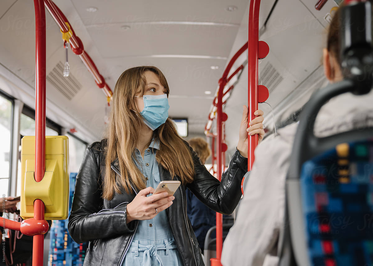 Woman Commuting With Surgical Mask