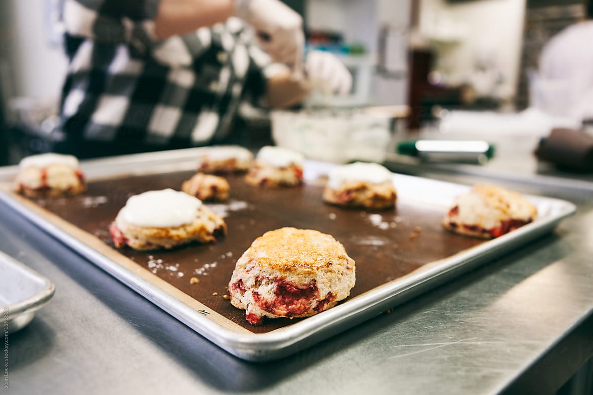 Bakery: Strawberry Scones On Tray Getting Icing