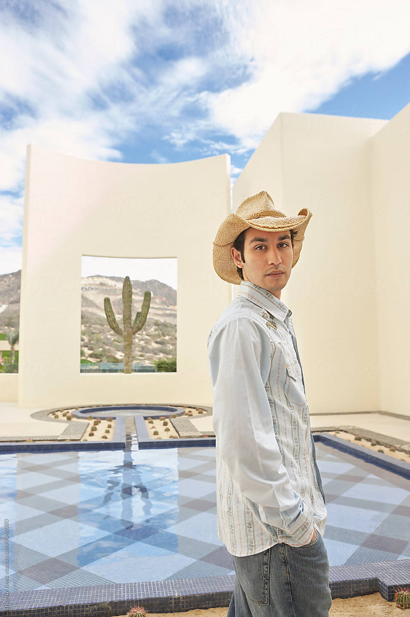 Portrait of man on vacation at luxury resort in desert