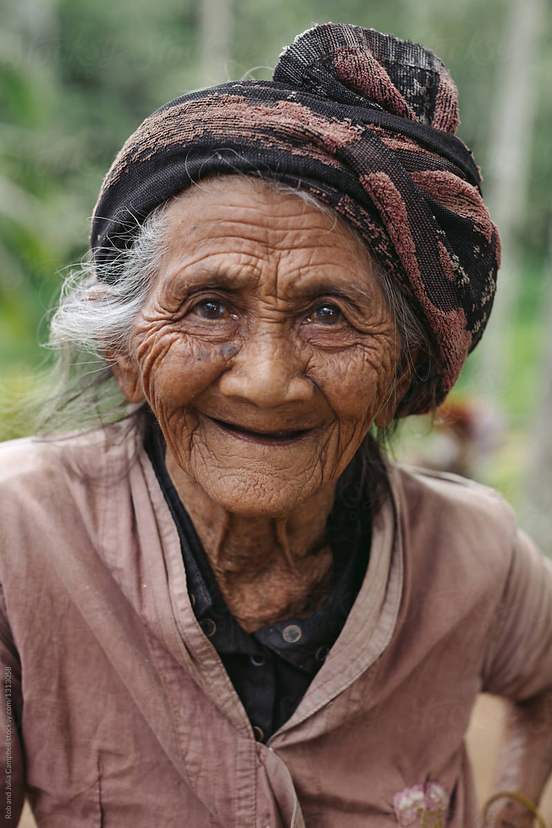Portrait Of Old Wrinkled Balinese Woman In Nature By Rob And Julia