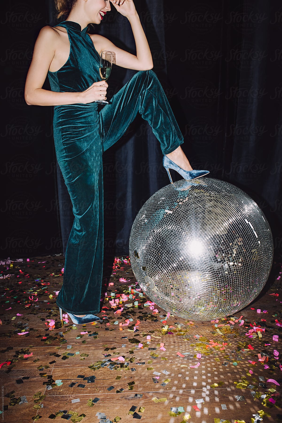 Woman Posing With Disco Ball