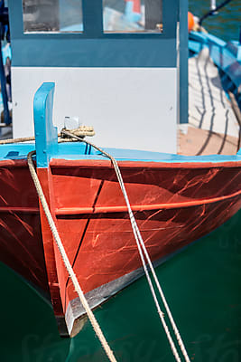 Traditional Small Wooden Fishing Boat On The Shore. by Stocksy
