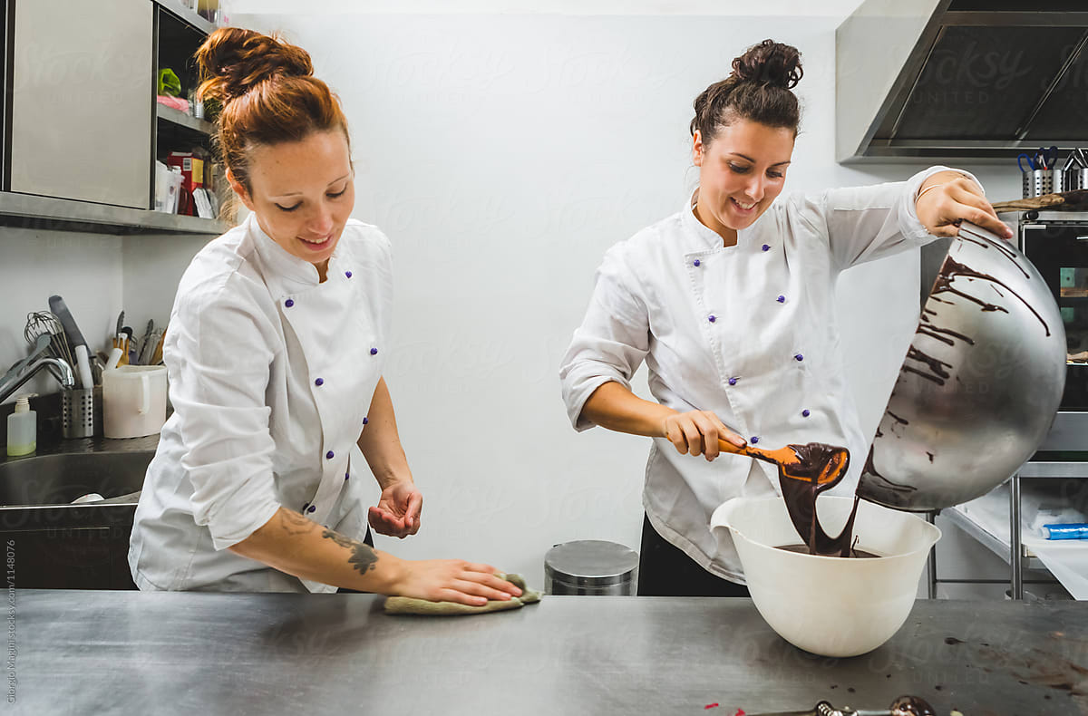 Two Women Pastry Chef Working in a Professional Kitchen