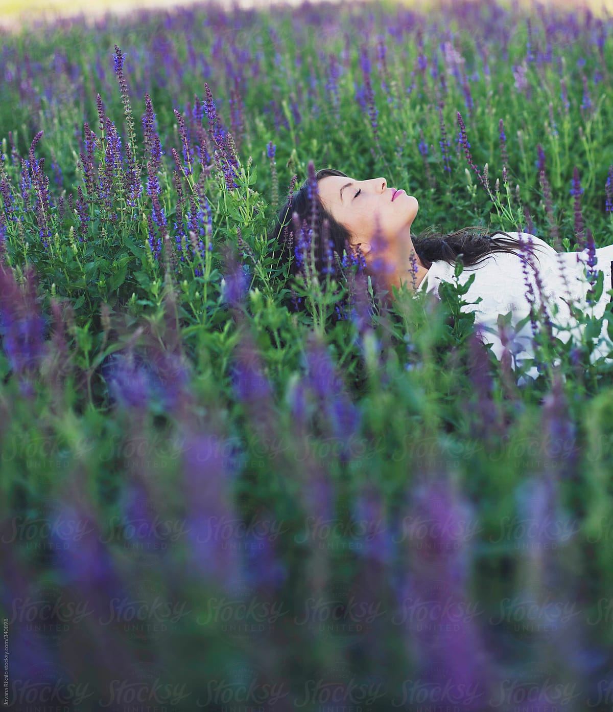 Beautiful Young Woman Lying In Flowers Del Colaborador De Stocksy Jovana Rikalo Stocksy