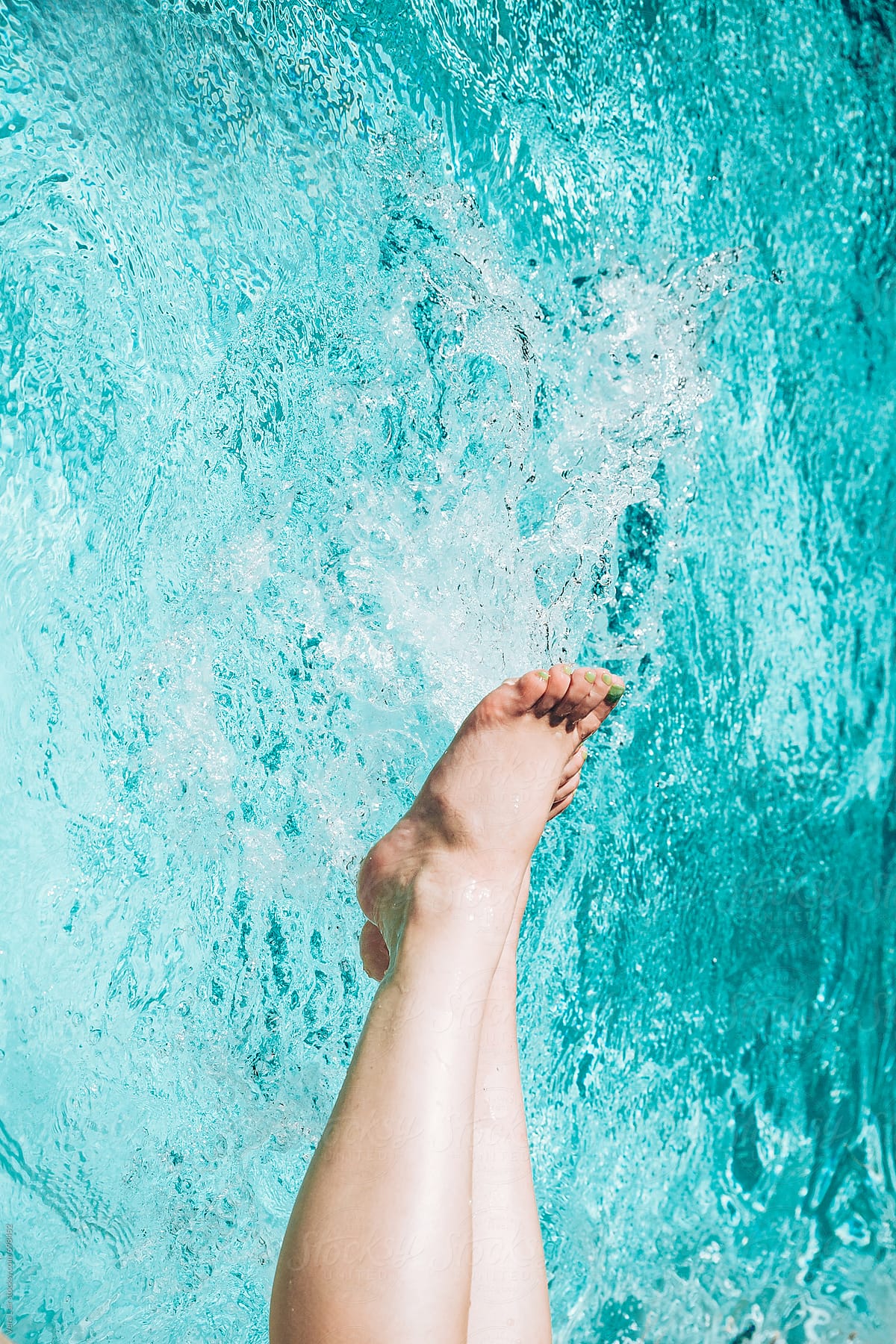 Woman Legs In The Pool By Stocksy Contributor Vera Lair Stocksy