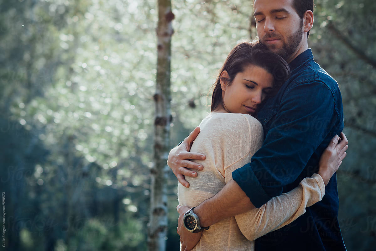 Young Couple Hugging In Forest By Stocksy Contributor Guille Faingold Stocksy 