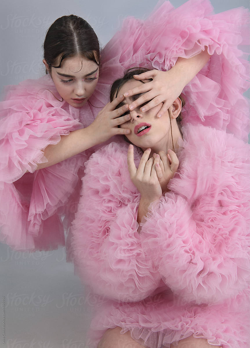 Two women in pink pastel color