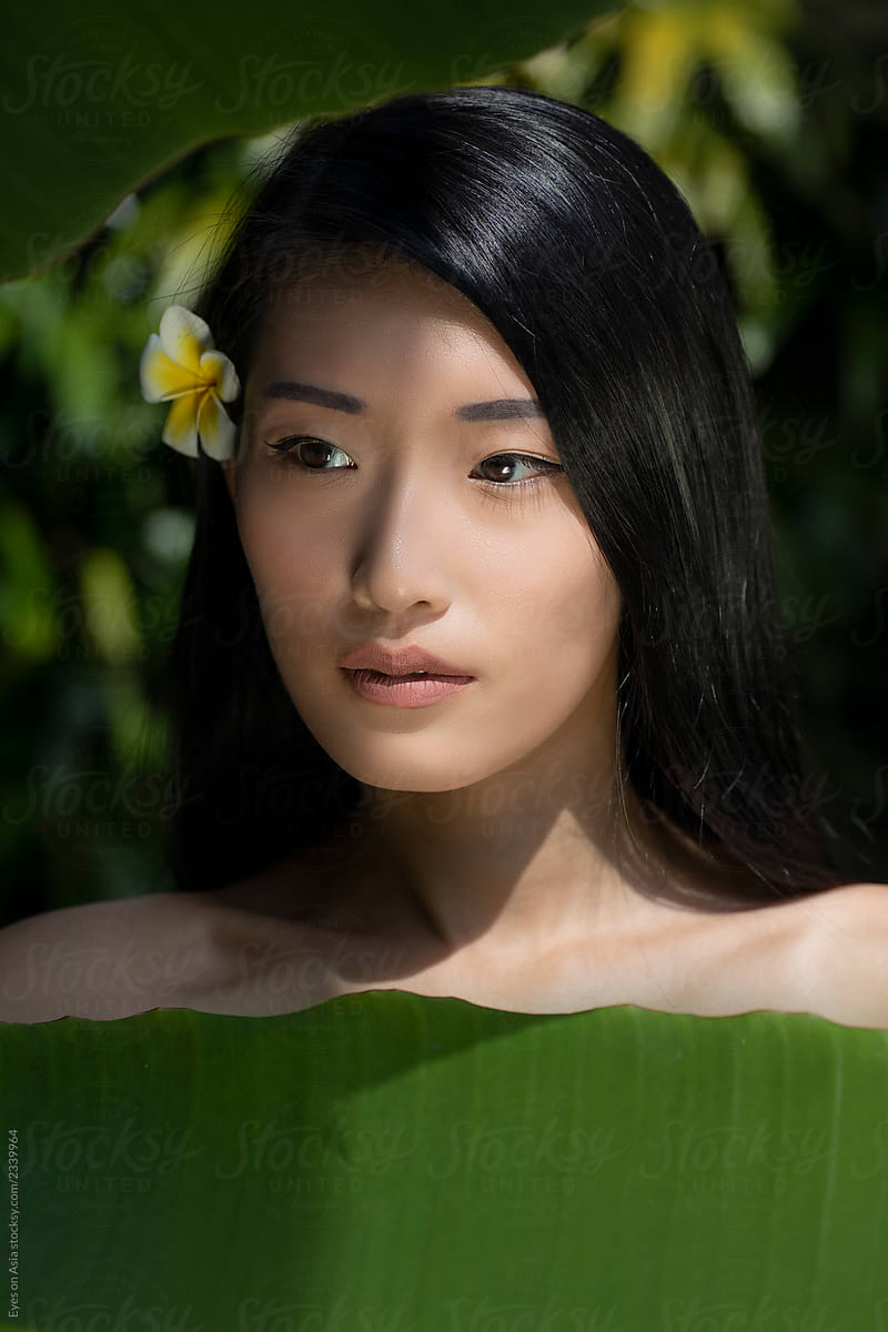 Tropical Beauty Portraiture Of An Asian Woman By Stocksy Contributor 6128