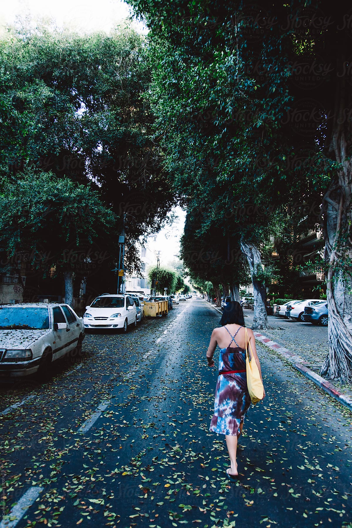 Woman Walking on Street