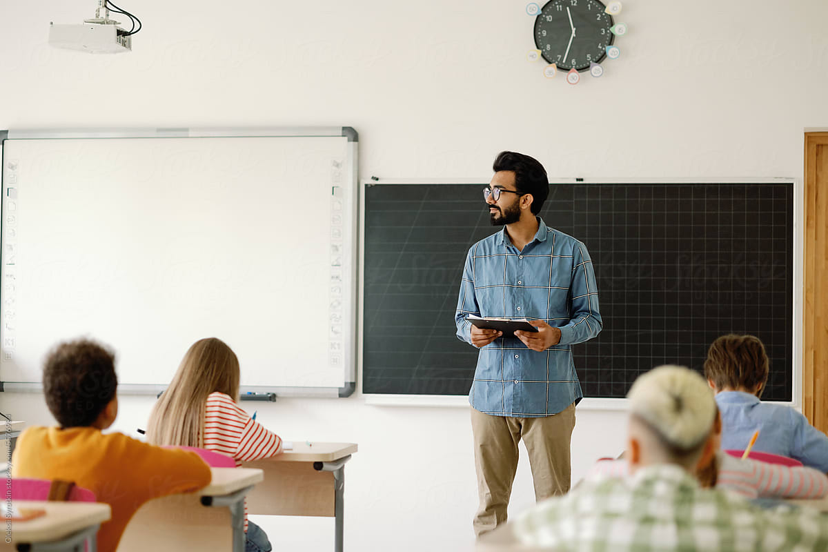 Multicultural tutor lesson blackboard auditorium lyceum