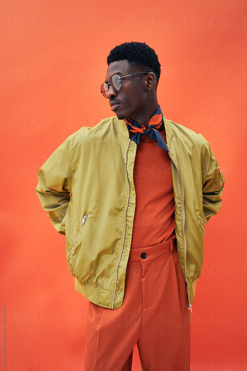 Black fashionable man model in stylish bomber jacket