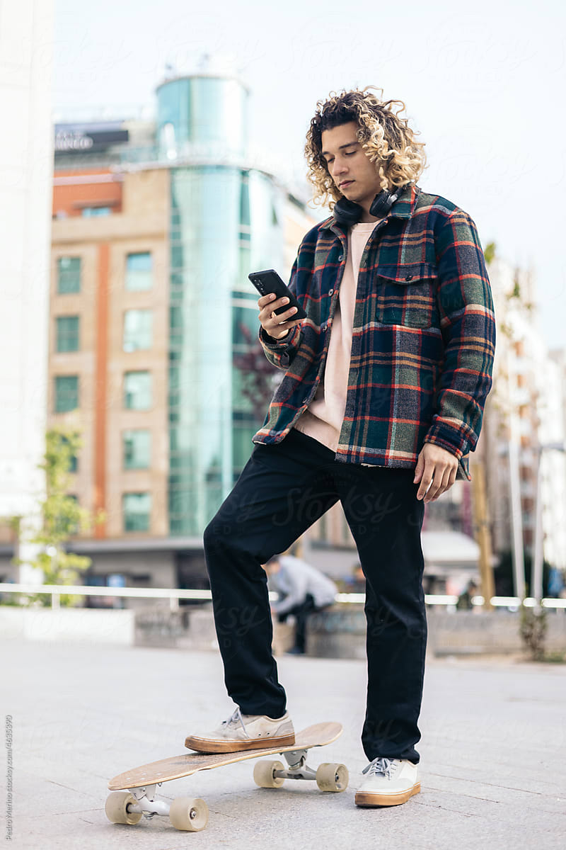 Skater using smartphone