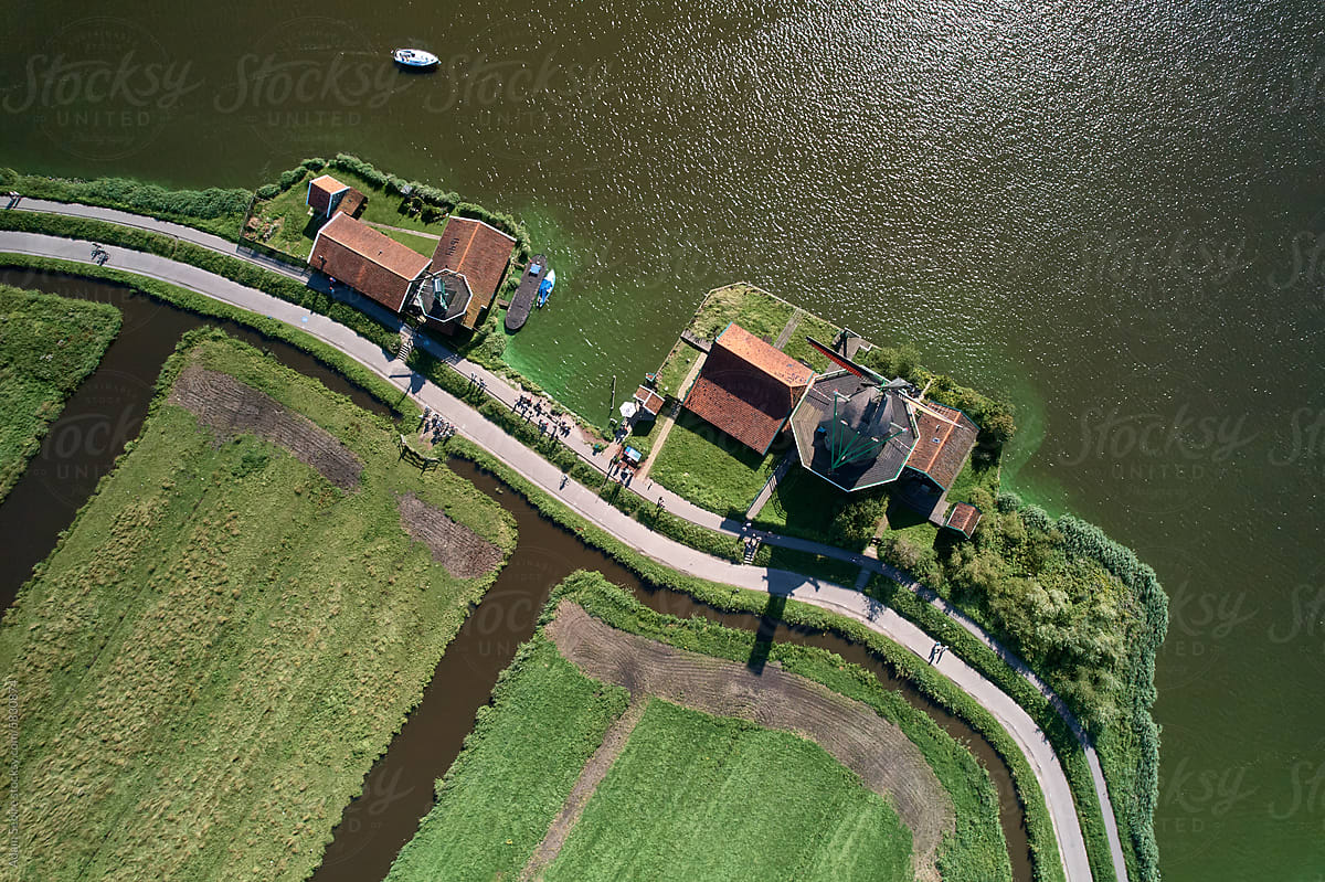 Windmill overhead shadow and dyke embankment - aerial shot