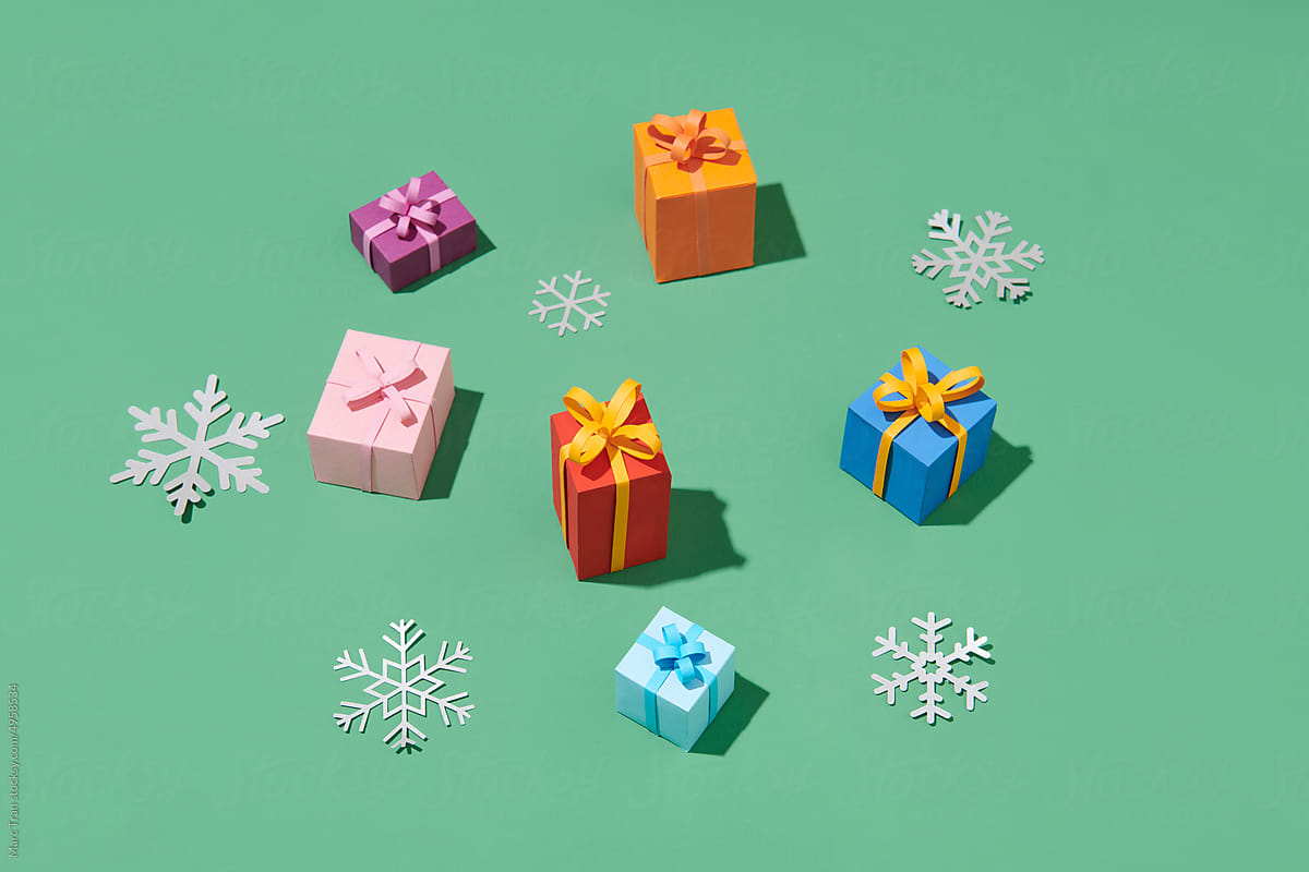 Many different Christmas gifts on green background