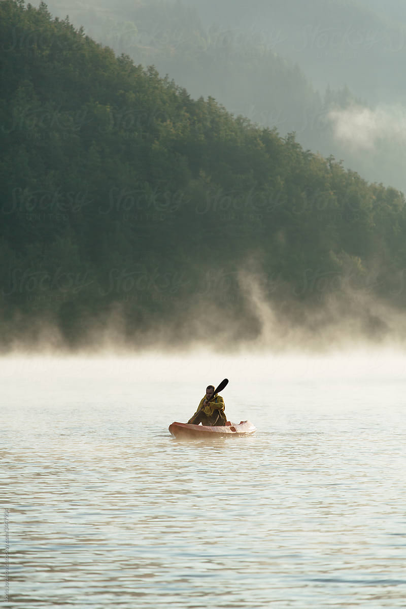 Man paddling in a canoe