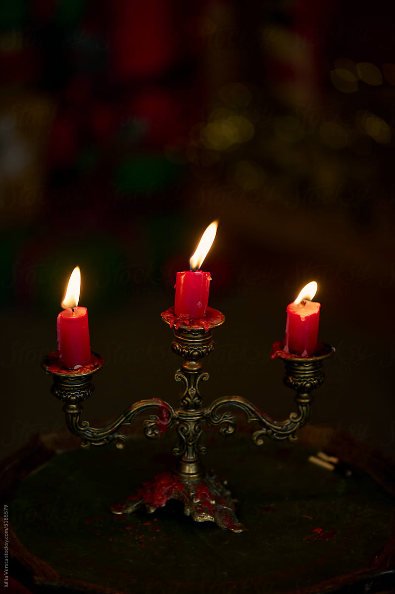 gothic candlestick with melting wax candles, - Stock