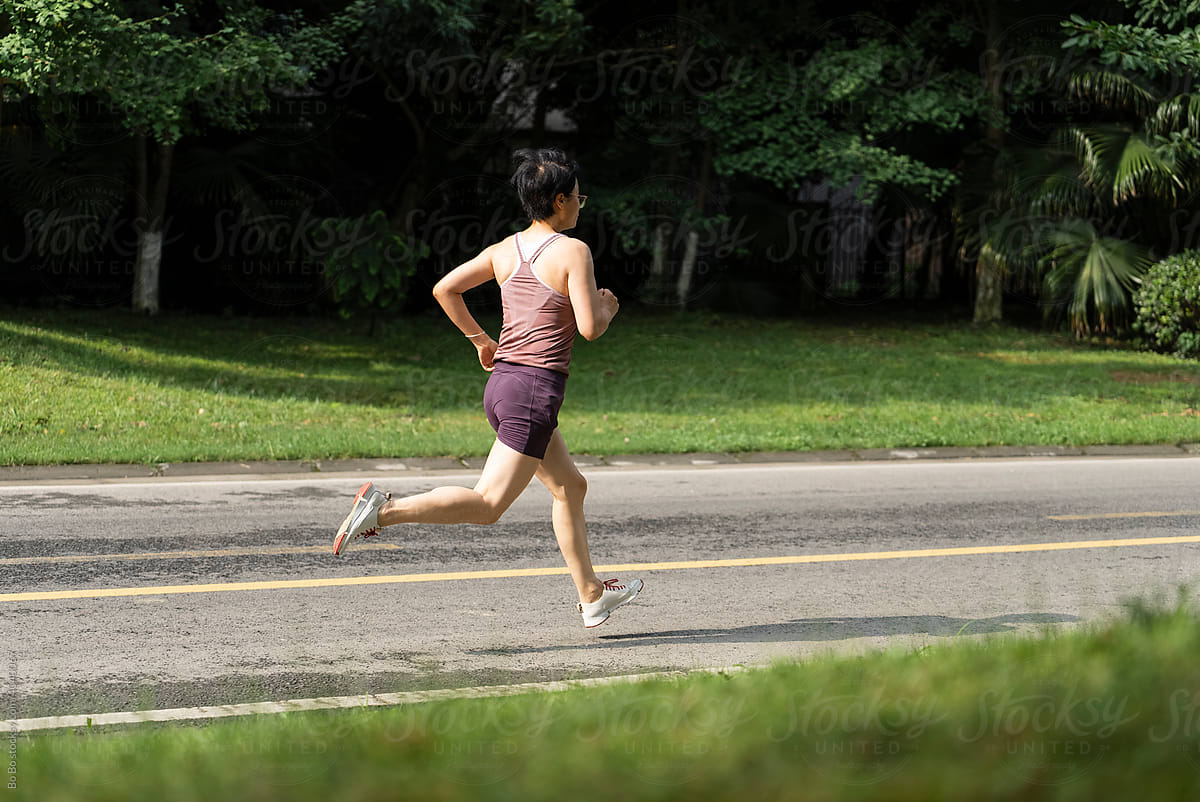Asian woman running
