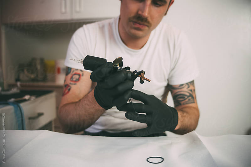 Tattoo artist preparing his tools
