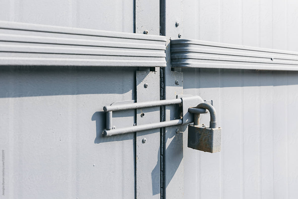 Close-up of a locked warehouse door.