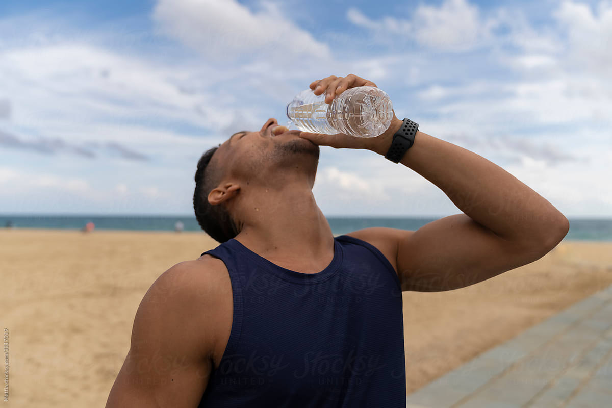 Man Drinking Water During Sport
