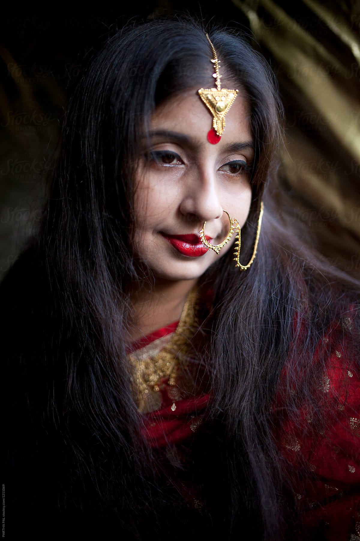 Young Indian woman with decorative Jewellery