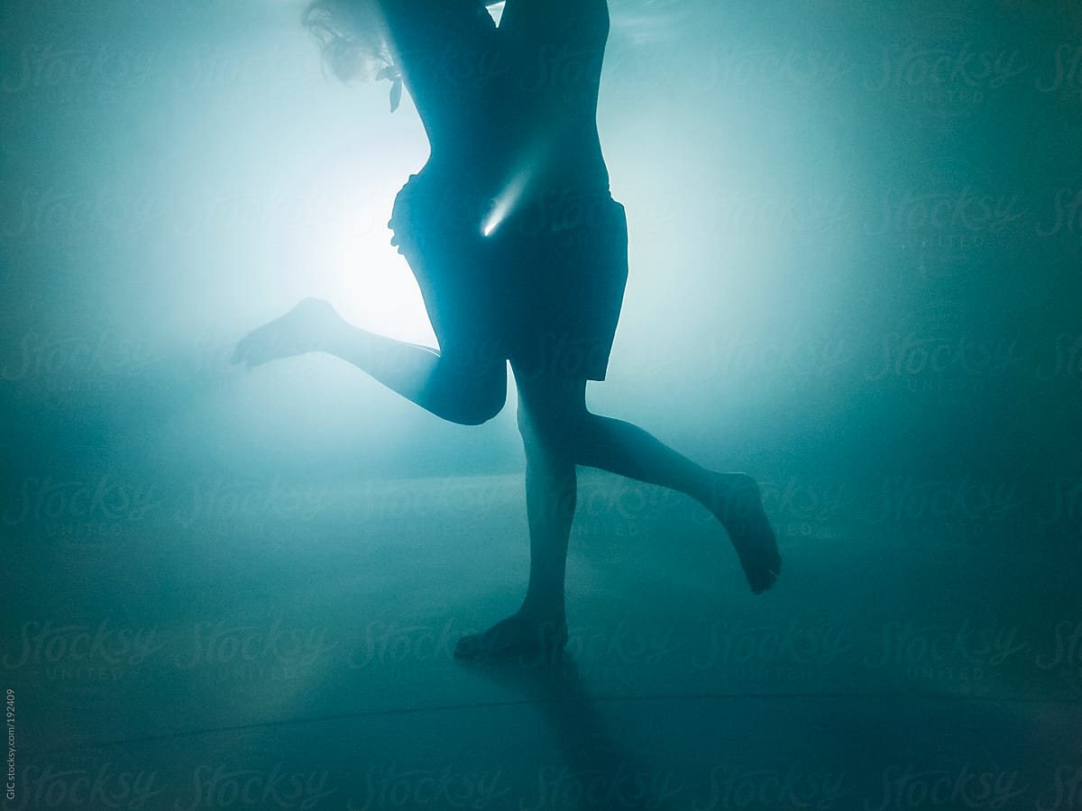 Couple Underwater By Stocksy Contributor Simone Wave Stocksy 