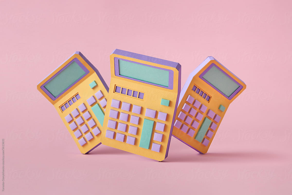 Three retro calculators from paper vertically standing.