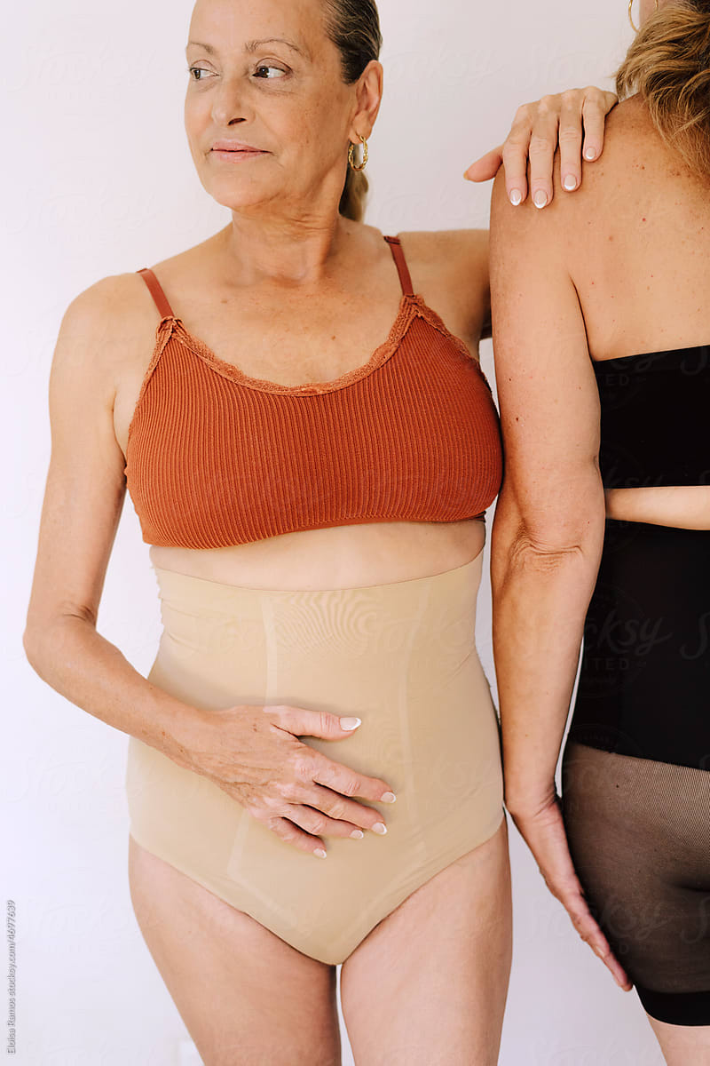 Crop Mature Women In Neutral Underwear by Stocksy Contributor