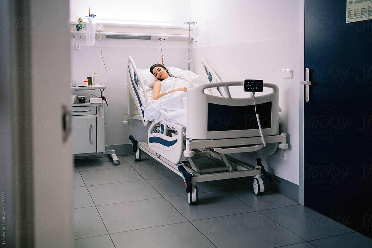 Female Patient In A Hospital.