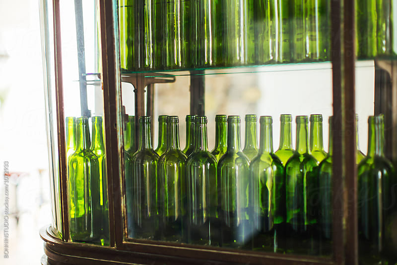 Green bottles in a restaurant.