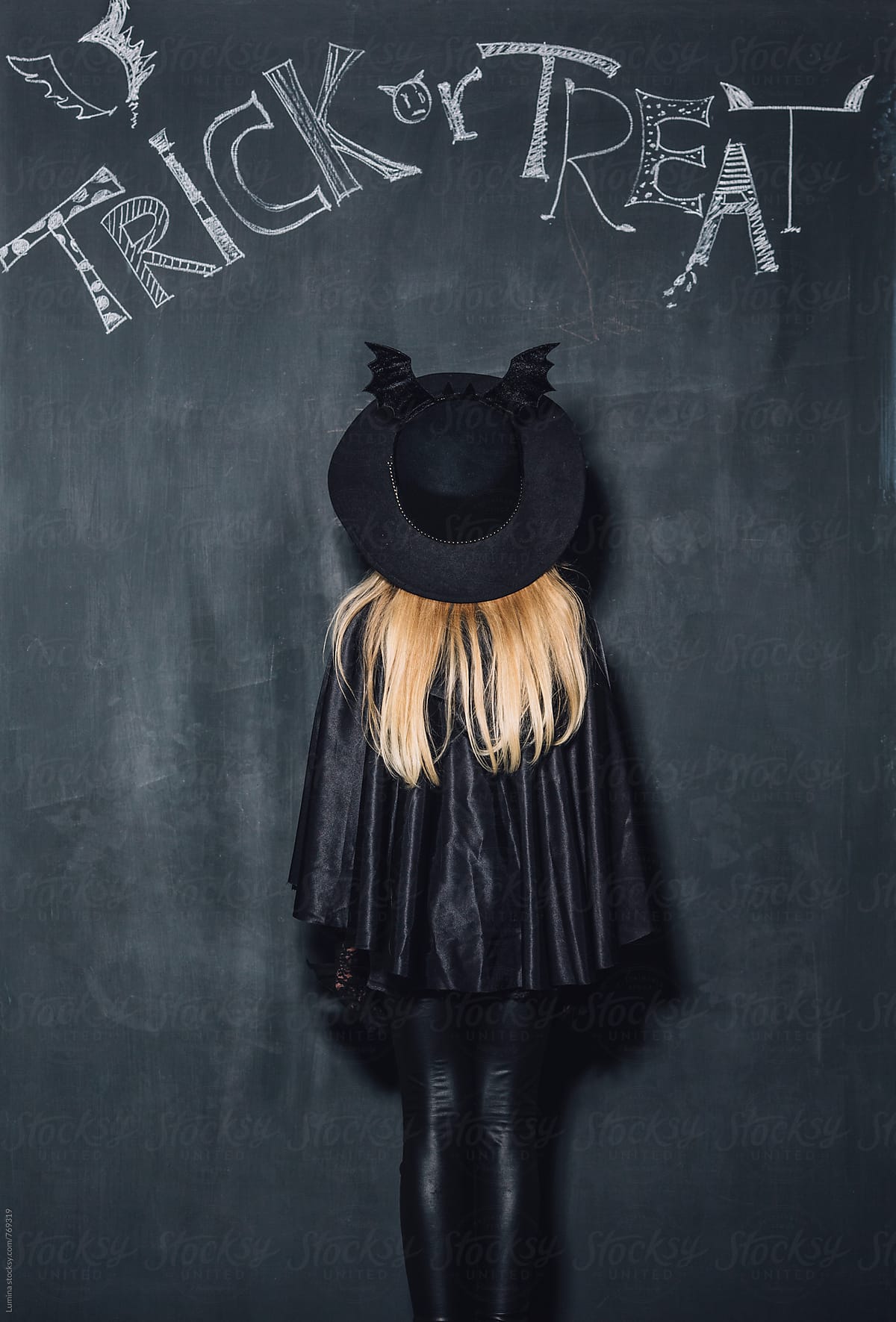Girl in a Witch Halloween Costume
