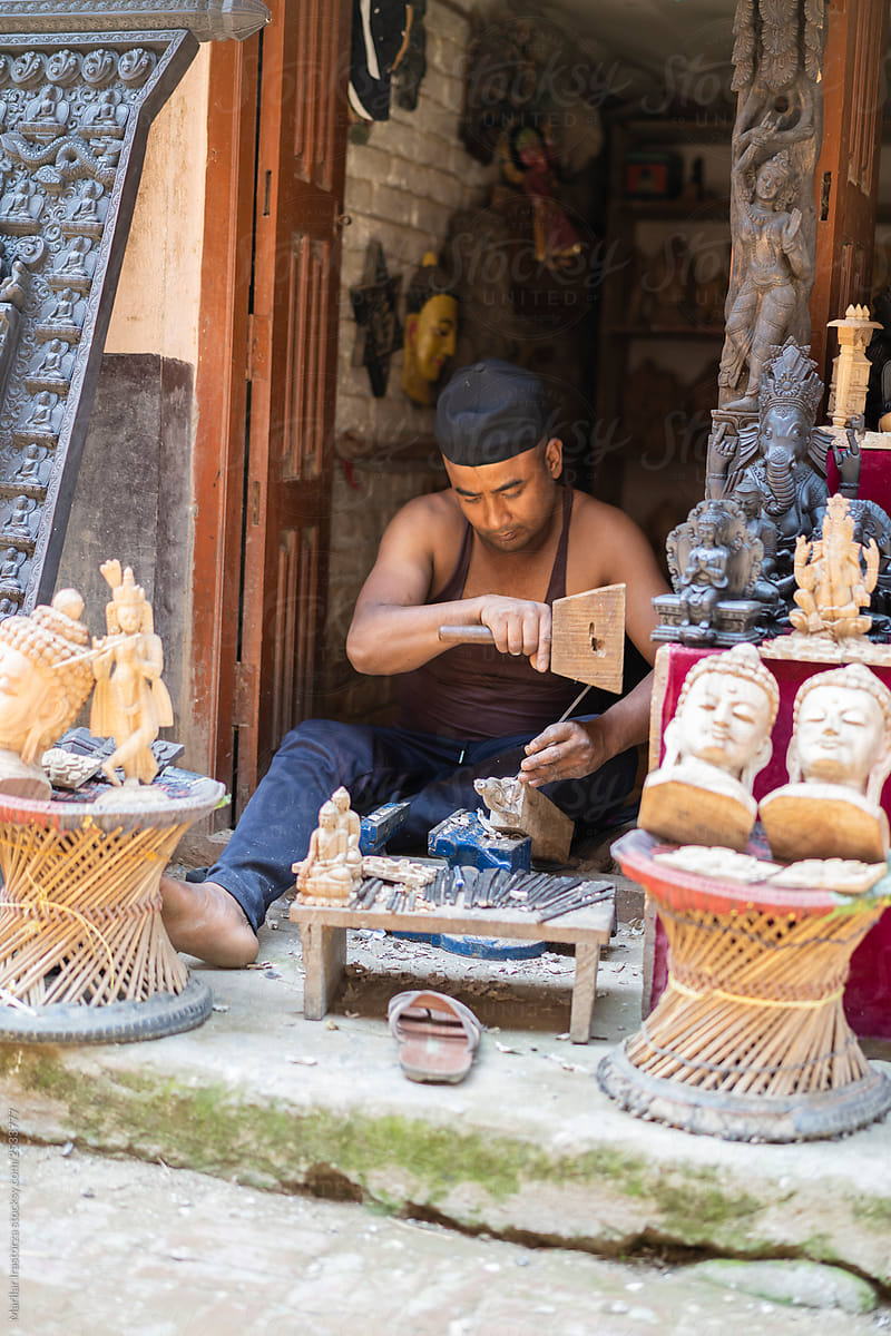 Craftsman Carving Wooden Figures in a Nepalese Village