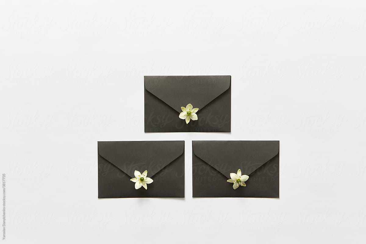 Black envelopes with flowers