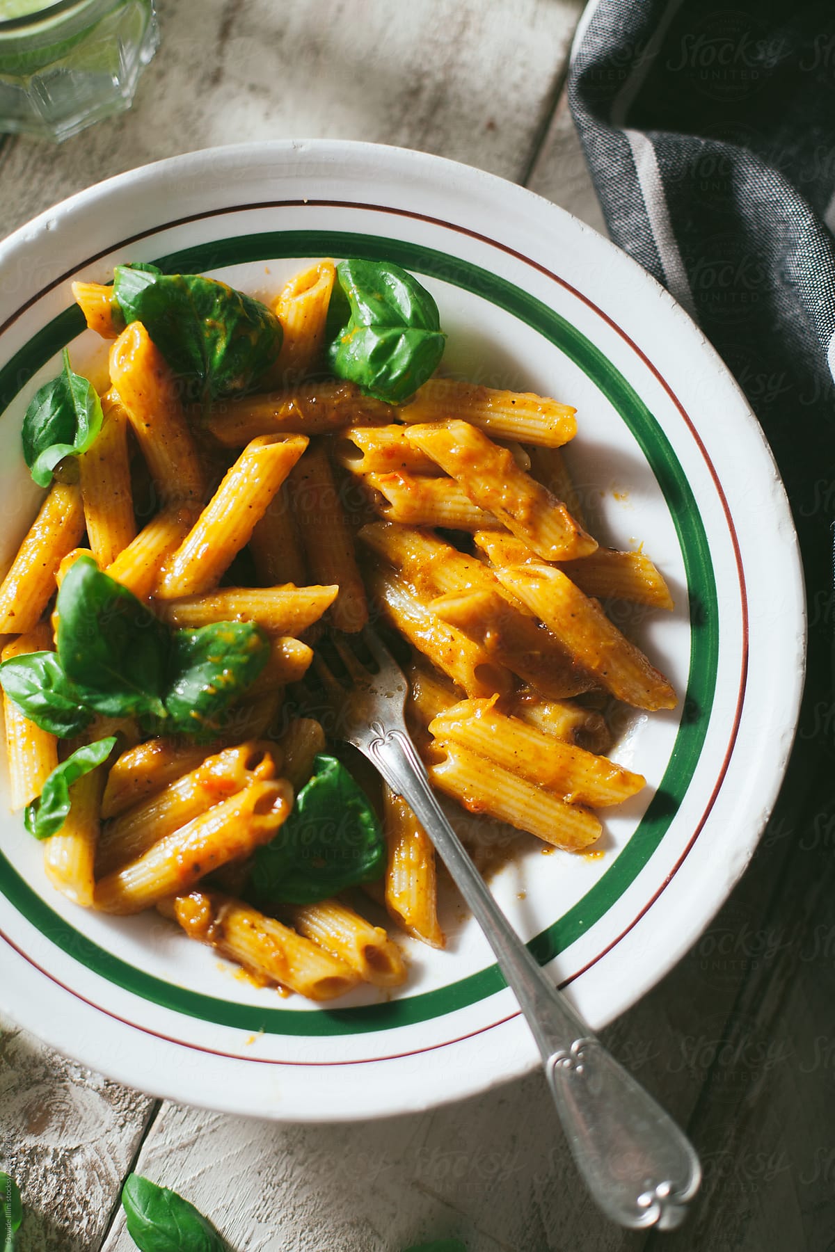 Pasta with pepper sauce and basil