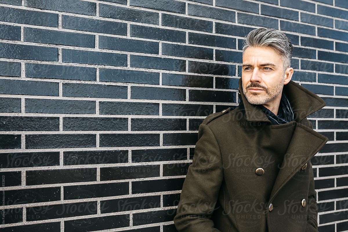 Fashionable businessman with bristle and grey hair