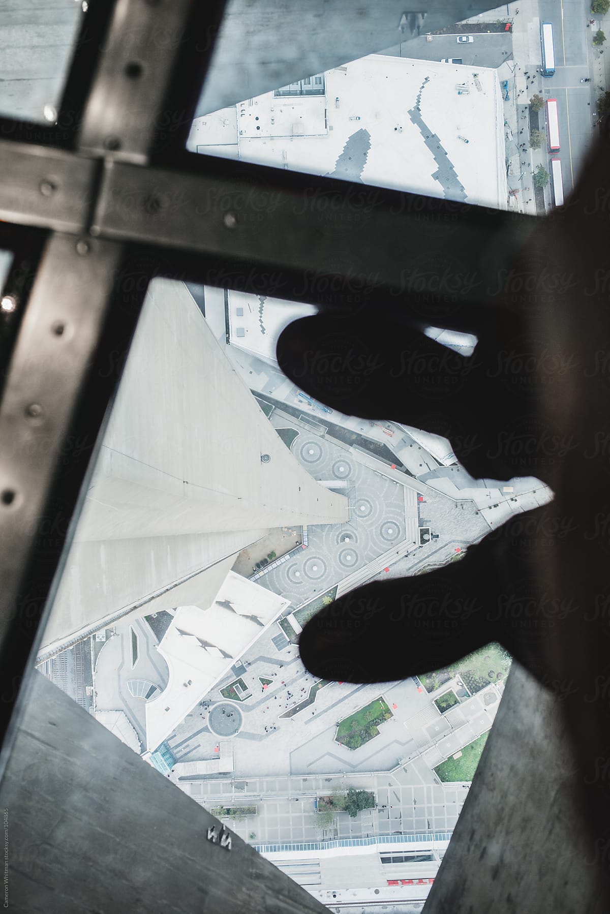 Looking down throught the glass floor in the CN tower