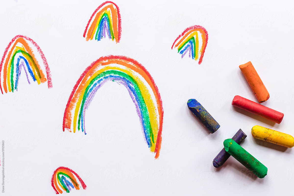 Colourful Rainbows Drawn on Paper