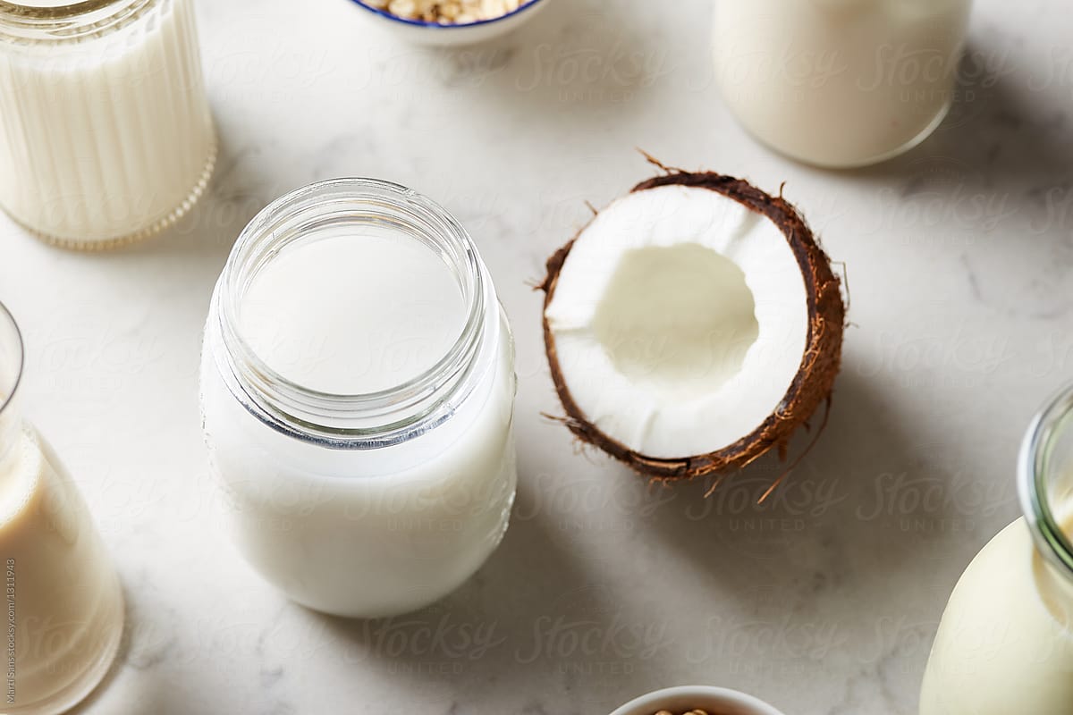 Coconut milk with halved coconut.