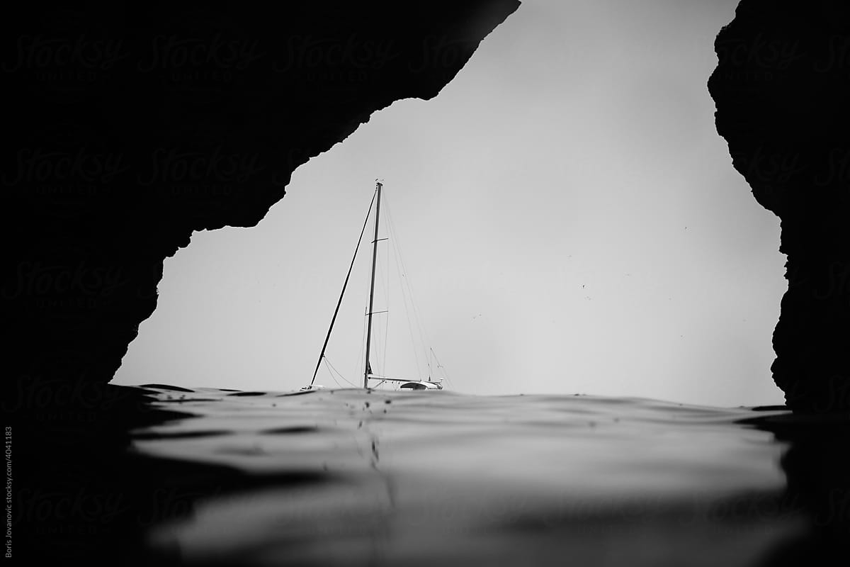 Sailing Boat On The Surface Of The Sea