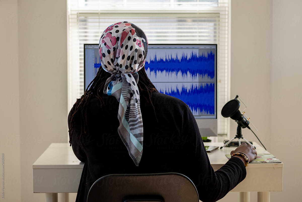 Woman recording a Podcast