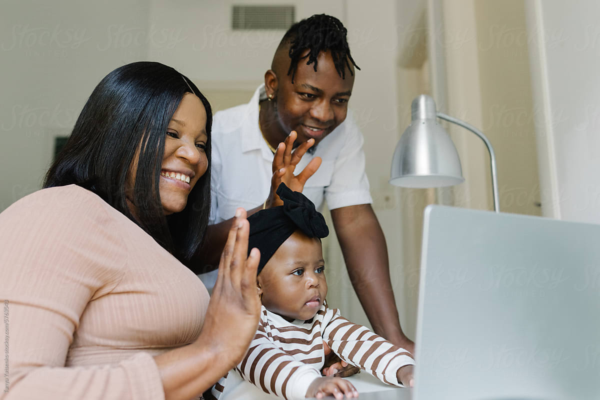 Family at home communicating online