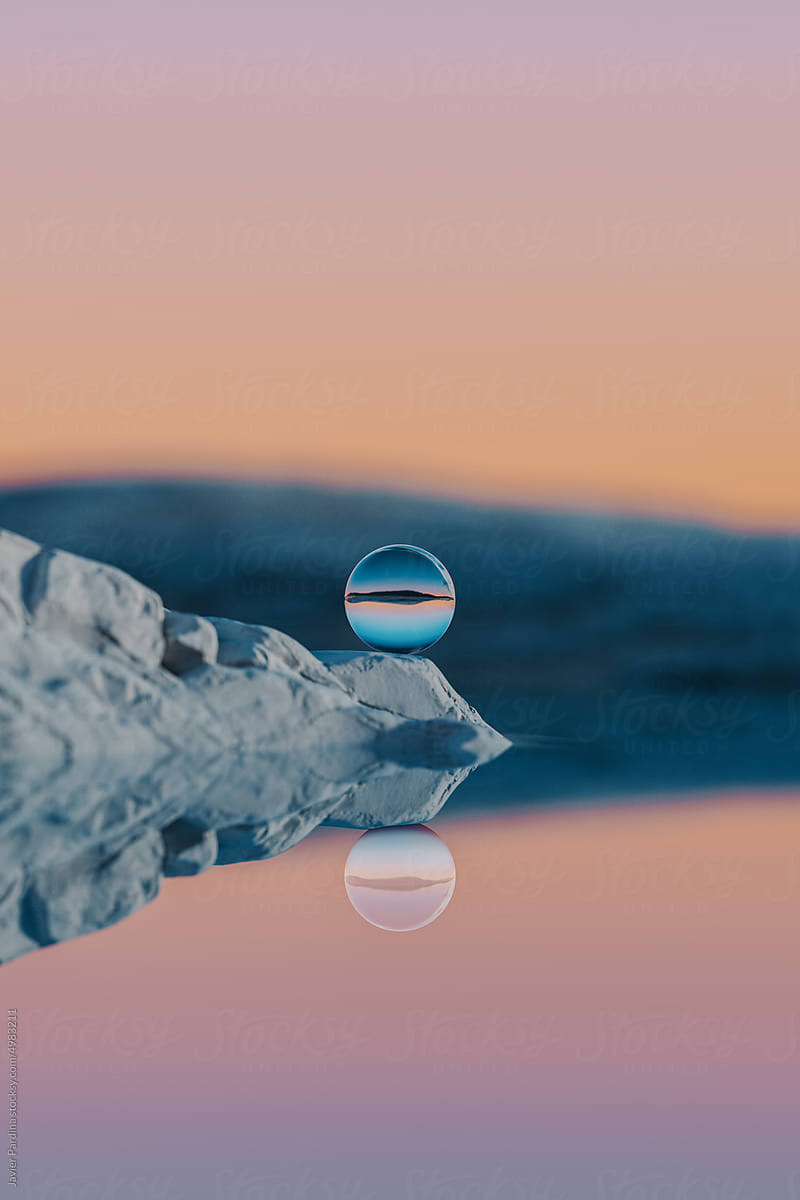 rendered landscape with glass sphere
