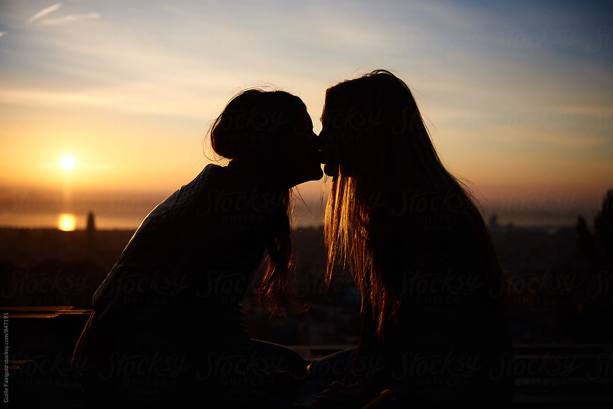 Silhouettes Of Girls Kissing By Stocksy Contributor Guille Faingold