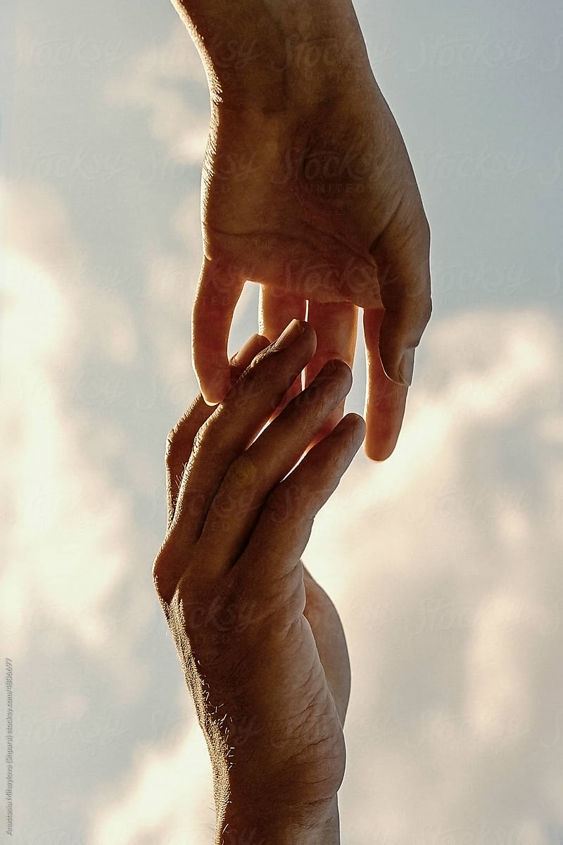 Close up photo of Loved Couple With Hand In Hand.